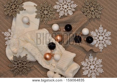 Christmas inspiartion on a knutted background. Top view.