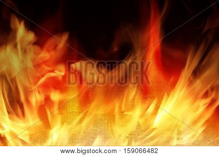 Farbic on fire with flames - Fire safety concept.