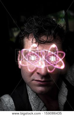 Dramatic portrait of concerned pensive man with atomic eyes
