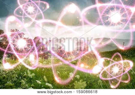 Magical landscape field with mountains and atomic particles