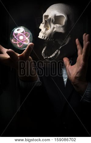 Angel of death holding magic crystal ball atom