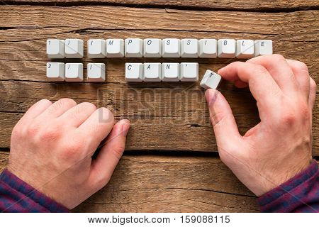 Man Changes The Words Impossible And I Can't To Possible And I Can Of Keyboards Keys