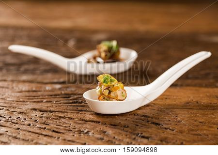 Thousand-leaf Sweet Potatoes, Smoked Tuna And Cucumber Pickles In A Spoon. Taste Gastronomy Fingerfo