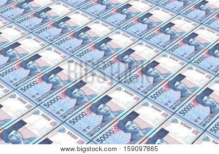 Indonesian rupiah bills stacks background. 3D illustration.