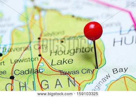 Tawas City pinned on a map of Michigan, USA