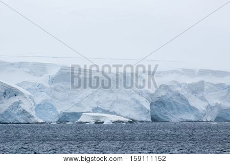 Antarctica in a cloudy day- Antarctic Peninsula - Palmer Archipelago - Neumayer Channel - Global warming - Fairytale landscape