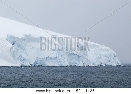 Antarctica in a cloudy day- Antarctic Peninsula - Palmer Archipelago - Neumayer Channel - Global warming - Fairytale landscape