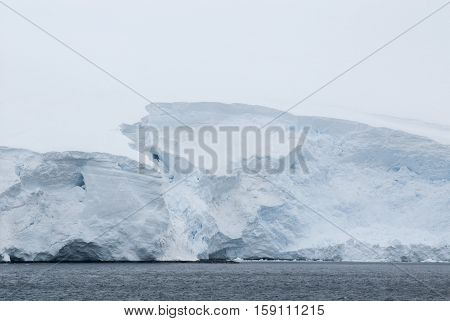 Antarctica in a cloudy day- Antarctic Peninsula - Palmer Archipelago - Neumayer Channel - Global warming - Fairytale landscape