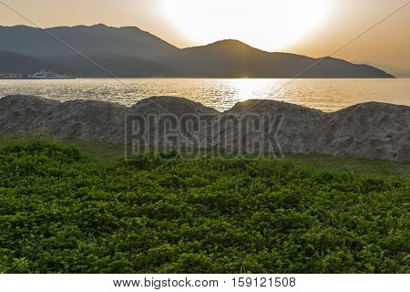Sunset on beach of Thassos town, East Macedonia and Thrace, Greece