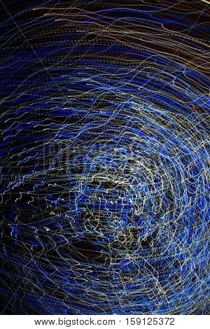 Abstract background made of Christmas lights with long exposure.