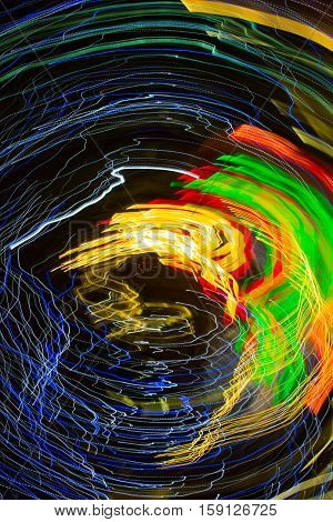 Abstract background made of Christmas lights with long exposure.