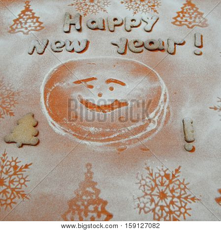 New Year 2018 cookies with powdered sugar under biscuits