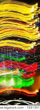 Abstract background made of Christmas lights with long exposure.