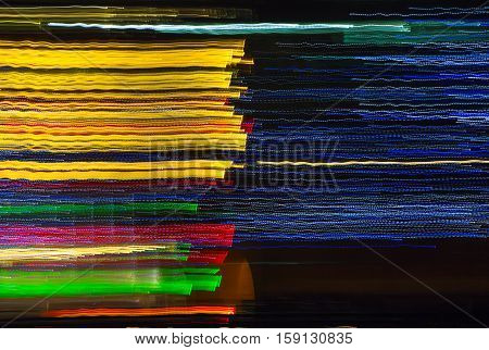 Abstract background made of Christmas lights with long exposure.