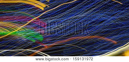 Abstract background made of Christmas lights with long exposure.