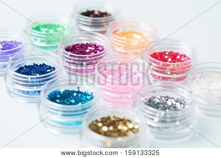 bright jars of glitter for nail decoration