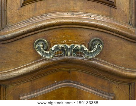 Vintage gate latch on the wooden door