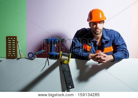 Handsome Man Builder With Tools