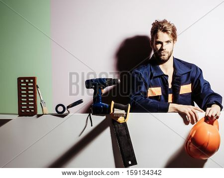 Handsome Man Builder With Tools
