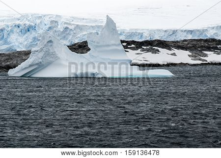 Antarctica in a cloudy day- Antarctic Peninsula - Palmer Archipelago - Neumayer Channel - Global warming - Fairytale landscape