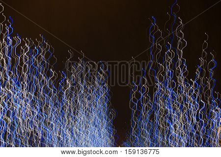 Abstract background made of Christmas lights with long exposure.