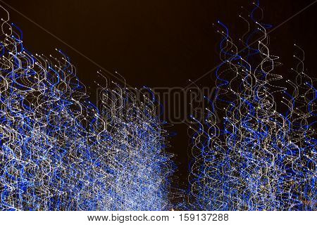 Abstract background made of Christmas lights with long exposure.