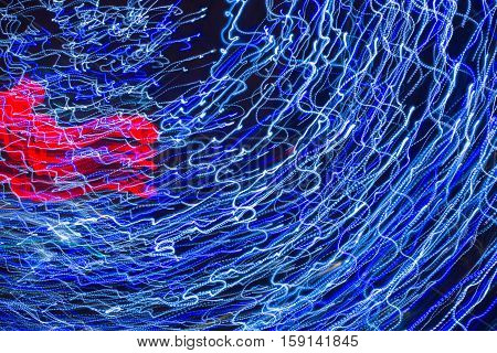 Abstract background made of Christmas lights with long exposure.