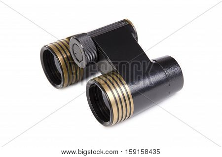 Old opera glasses on a white background isolation