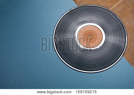 Vinyl Musical Disc On Blue And Wooden Background;