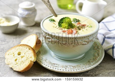 Vegetable Chowder With Cheese In A Blue Vintage Bowl.
