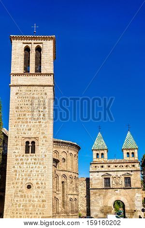 Santiago del Arrabal Church and Puerta de Bisagra Nueva Gate in Toledo - Spain