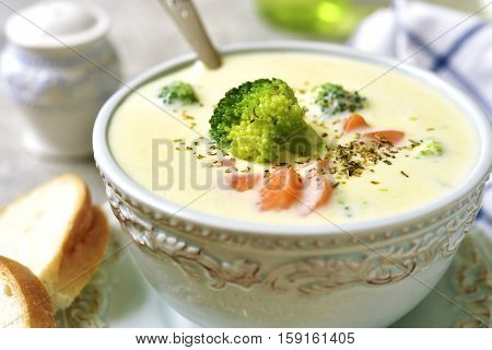 Vegetable Chowder With Cheese In A Blue Vintage Bowl.