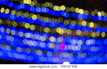 Abstract background made of Christmas lights with long exposure.