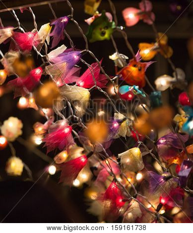 London, UK - December 19, 2015: Christmas lights decorations at Southwark open market in London. Christmas background