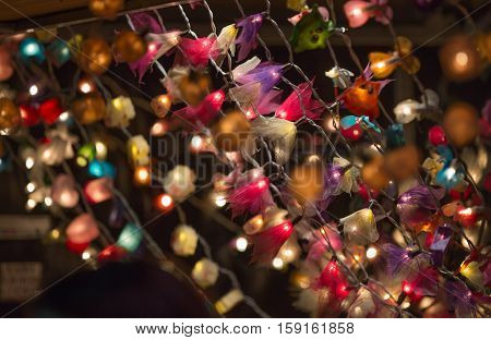 London, UK - December 19, 2015: Christmas lights decorations at Southwark open market in London. Christmas background