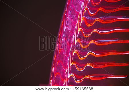 Abstract background made of Christmas lights with long exposure.