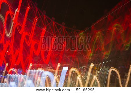 Abstract background made of Christmas lights with long exposure.