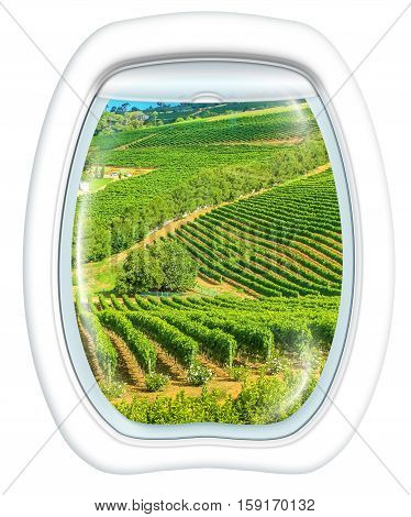 Plane window on grapevine of Constantia Valley, Cape Town in South Africa, from a plane through the porthole. Copy space.