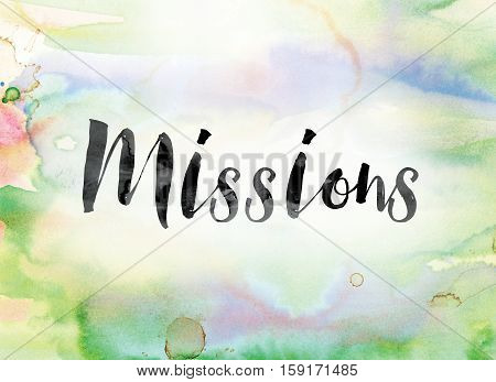 The word "Missions" painted in black ink over a colorful watercolor washed background concept and theme.