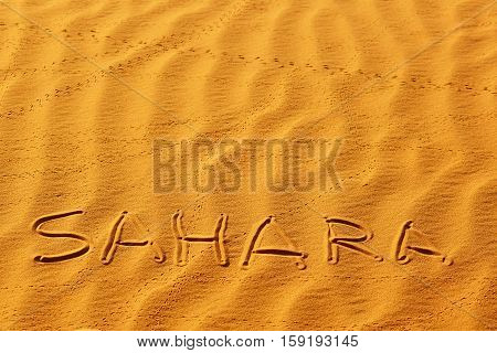 Word Sahara Written On The Sand