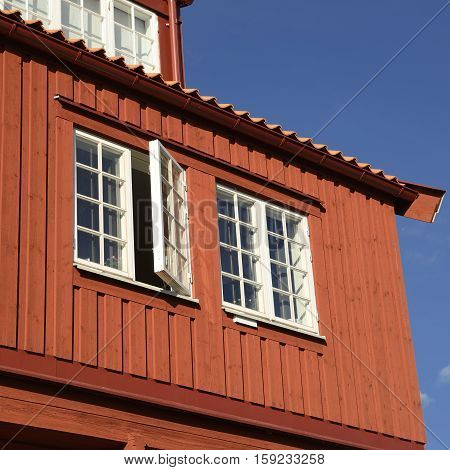 Closeup of a traditional Swedish red wooden facade