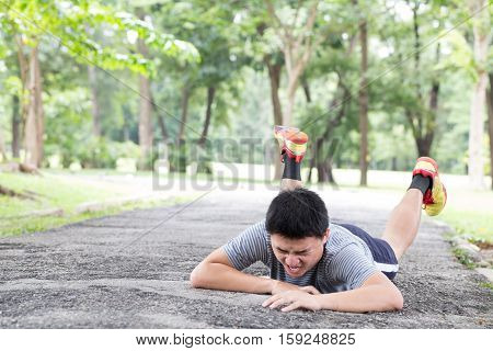 Sport accident injury. stumble and fall while jogging