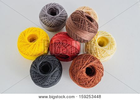 close up Piles of multicolored balls yarn