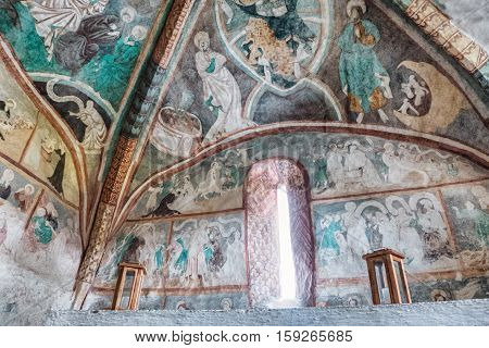 LUDROVA SLOVAKIA - APRIL 20: Medieval wall paintings in all Saints Gothic Church on April 20 2016 in Ludrova