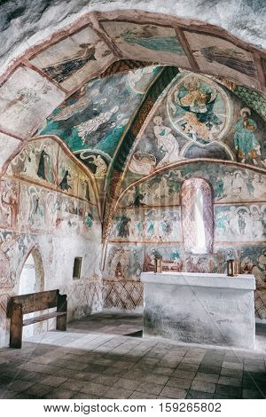LUDROVA SLOVAKIA - APRIL 20: Medieval wall paintings in all Saints Gothic Church on April 20 2016 in Ludrova