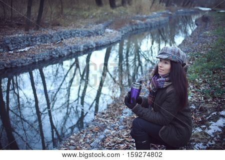 Portrait young beautiful woman river park outdoors