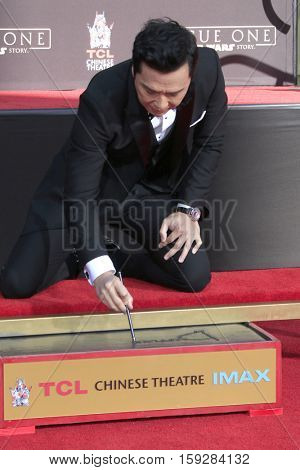 LOS ANGELES - DEC 1:  Donnie Yen at the Donnie Yen Hand And Footprint Ceremony at TCL Chinese Theater IMAX on December 1, 2016 in Los Angeles, CA