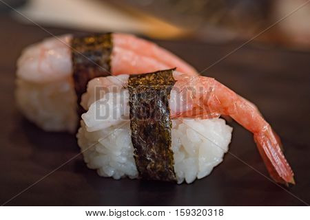 Close up of delicious japanese food call nigiri sushi made from sweet shrimp seaweed and japanese rice in local sushi food kanazawa japan.