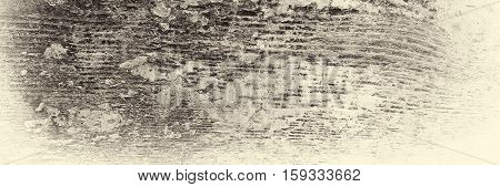 It is a very old damaged board with peeling paint