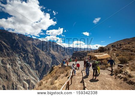 AREQUIPA, PERU - JULY 15 tourists watching condors in the Colca Canyon at Arequipa Peru on july 15th, 2015.